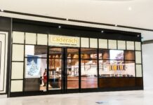 Swiss chocolate company to open 34 stores in U.S Swiss chocolate company to take over 34 Godiva stores in U.S