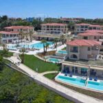 Bain Capital sells Greek resort to Fattal Hotel Group Bain Capital sells Greek resort to Fattal Hotel Group